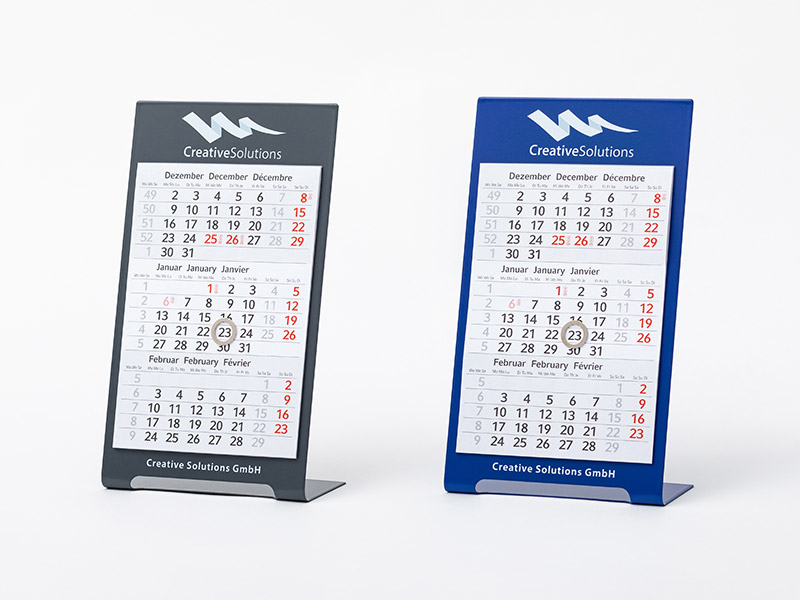 Die Abbildung zeigt zwei Tischkalender Metall in den Farben grau und blau.